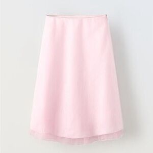 Pink linen skirt with tulle ruffle hem and mini rhinestone detail at the waist